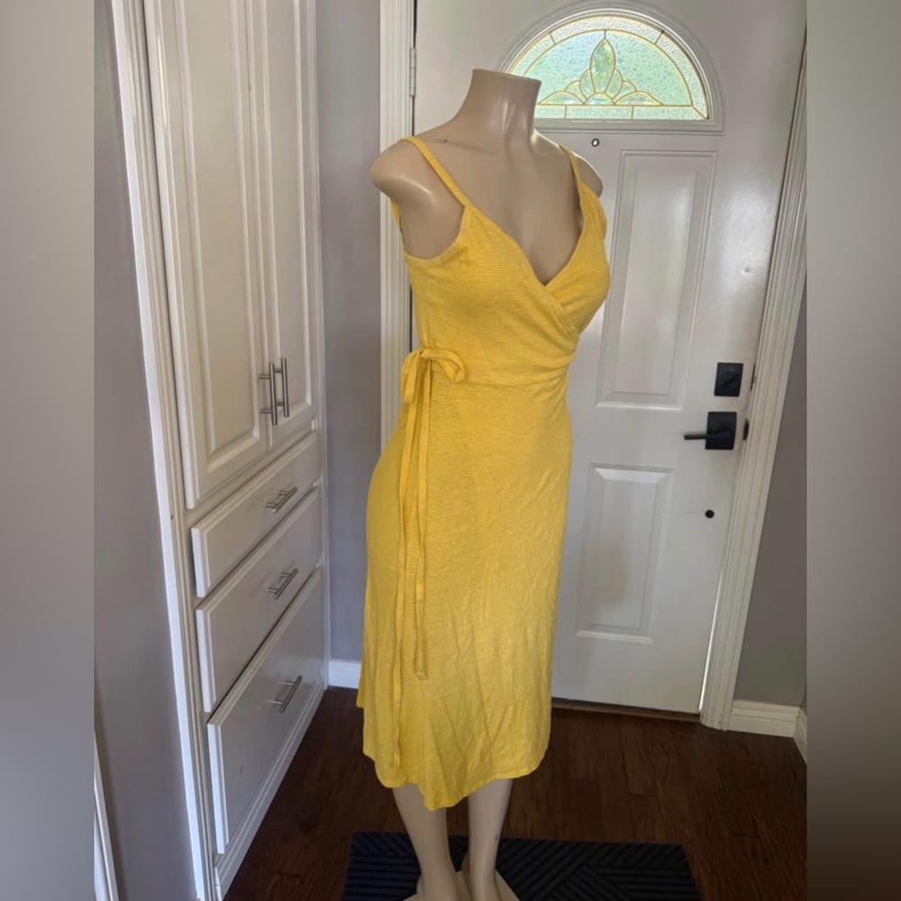 New with tags. Women’s Yellow Wrap Dress by Patagonia size M